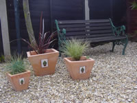 The garden is fully furnished ready for alfresco entertaining